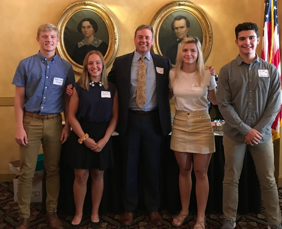 group of students and a man